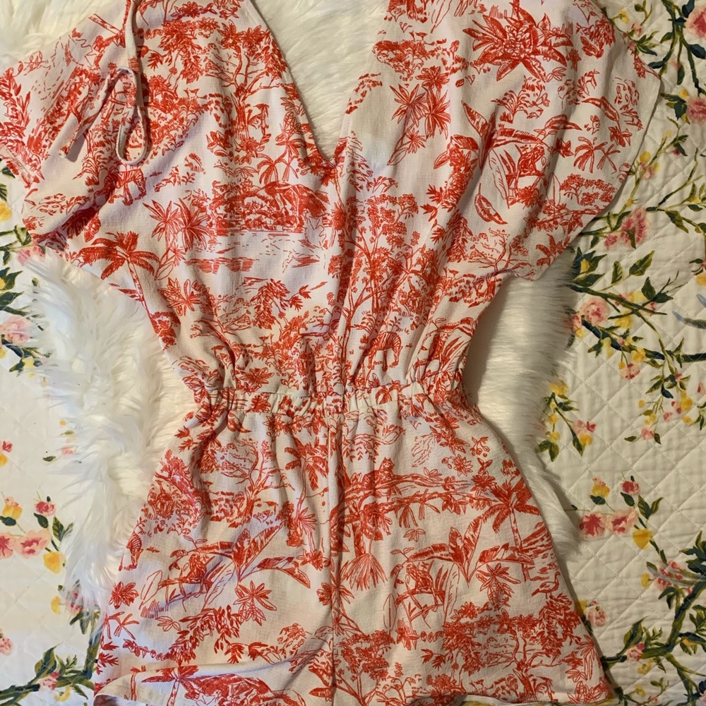 Size small tropical print romper.